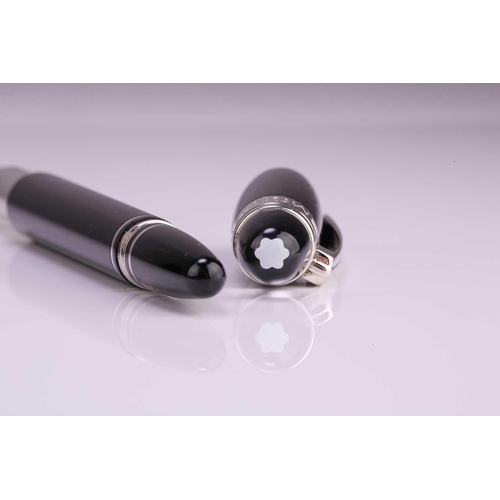 351 - A Montblanc Meisterstück Starwalker, with black resin body, screw cap and silver plated mounts, with... 