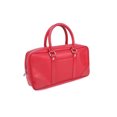 353 - A Louis Vuitton red epi-leather handbag with zip fastening and a matching card wallet together with ... 