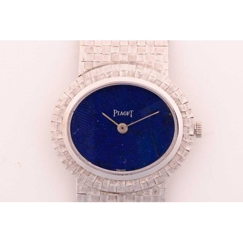 359 - A Piaget 18ct white gold ladies wristwatch, the oval blue lapiz minimalist dial with silvered hands,... 