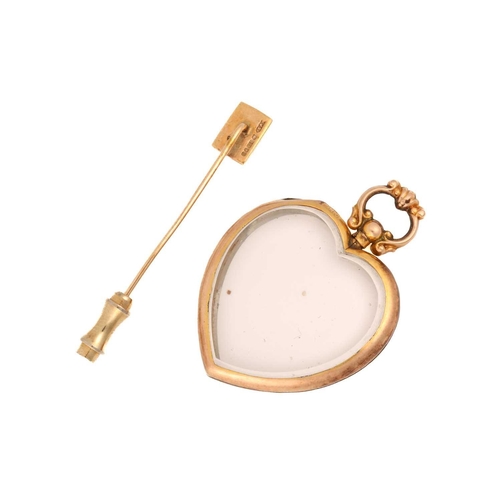 37 - A 9ct yellow gold heart pendant and tie pin; the thick glass has been fitted into a heart-shaped mou... 