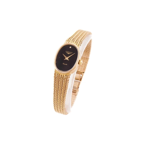 380 - A lady's Longines dress watch, featuring a Swiss-made quartz movement in an oval yellow gold case st... 