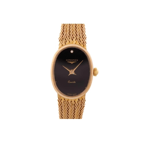 380 - A lady's Longines dress watch, featuring a Swiss-made quartz movement in an oval yellow gold case st... 