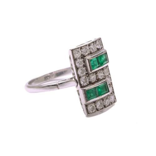 42 - An Art Deco emerald and diamond panel ring, the slightly curved rectangular panel is pavé-set with o... 