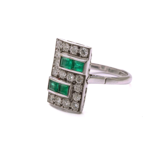 42 - An Art Deco emerald and diamond panel ring, the slightly curved rectangular panel is pavé-set with o... 