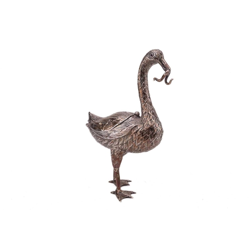 432 - A Continental silver standing swan, 19th/20th century, an eel in its beak, the top wings hinged at t... 