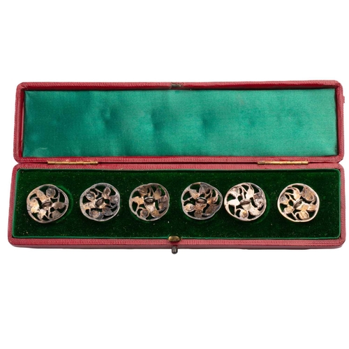 438 - A cased set of six silver buttons, London 1904 by Samuel Jacob, pierced foliate design, in a fitted ... 