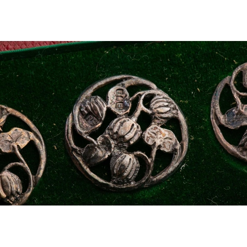 438 - A cased set of six silver buttons, London 1904 by Samuel Jacob, pierced foliate design, in a fitted ... 