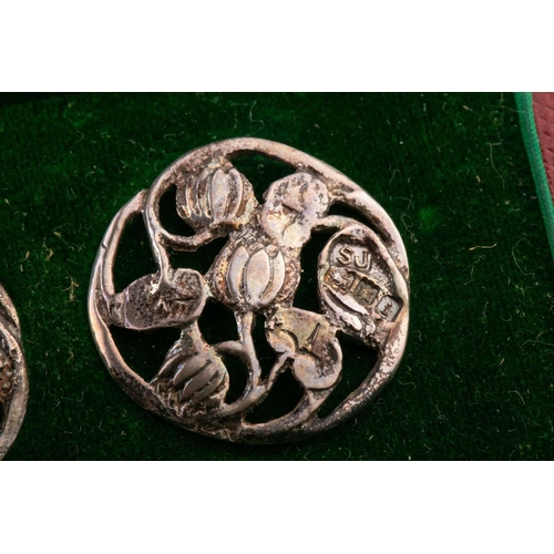 438 - A cased set of six silver buttons, London 1904 by Samuel Jacob, pierced foliate design, in a fitted ... 