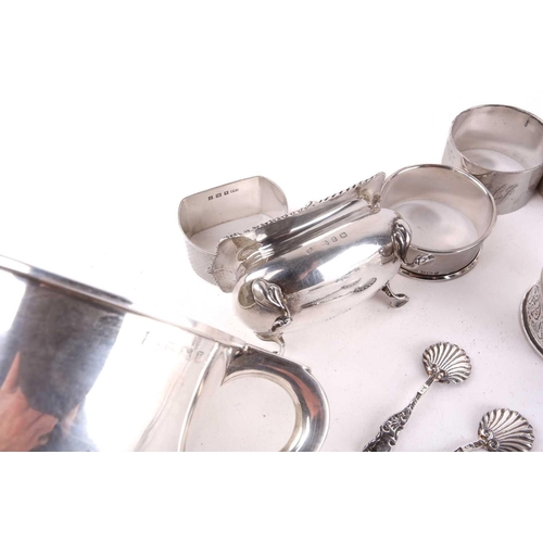 443 - A small collection of silver to include a two handled porringer, Birmingham 1930 by Barker Brothers,... 