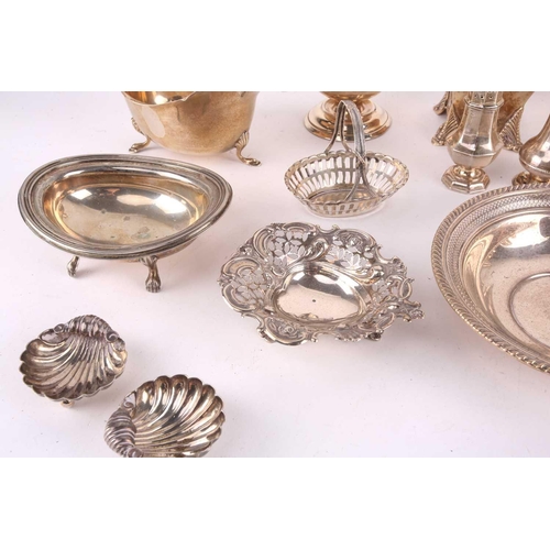 448 - A collection of Victorian and later silver hollow wares including a sugar castor, London 1938 makers... 