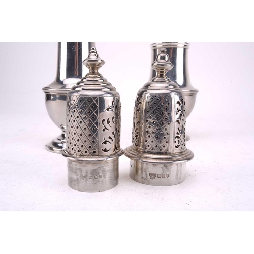 456 - Two silver sugar casters each with spool knop and of baluster form with flared foot, 20cm high, Lond... 