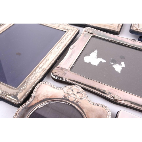 464 - A collection five modern silver fronted easel photograph frames of various design and manufature, to... 