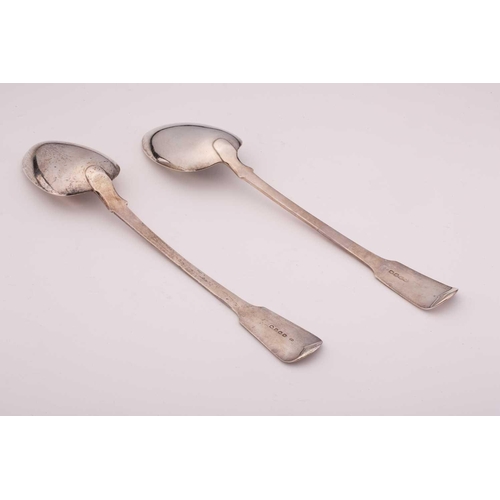 471 - Two George III silver fiddle pattern basting spoons, the largest engraved with a monogram, by Soloma... 