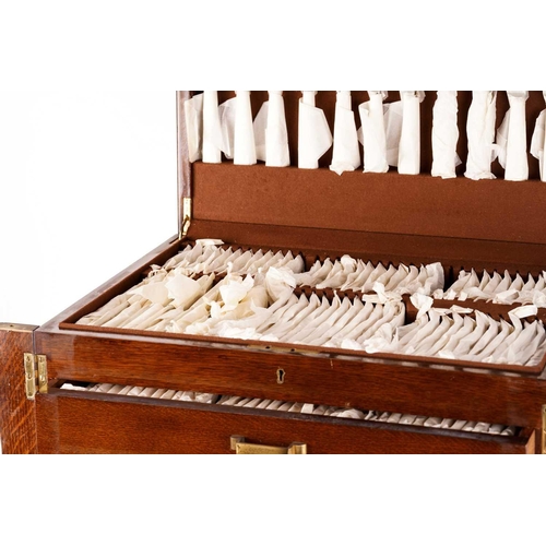 477 - A large silver plated canteen in oak three drawer case for twelve place settings, comprising of twel... 