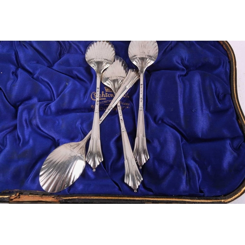 487 - A late Victorian set of six silver coffee spoons and matching sugar tongs the spoons with shell shap... 