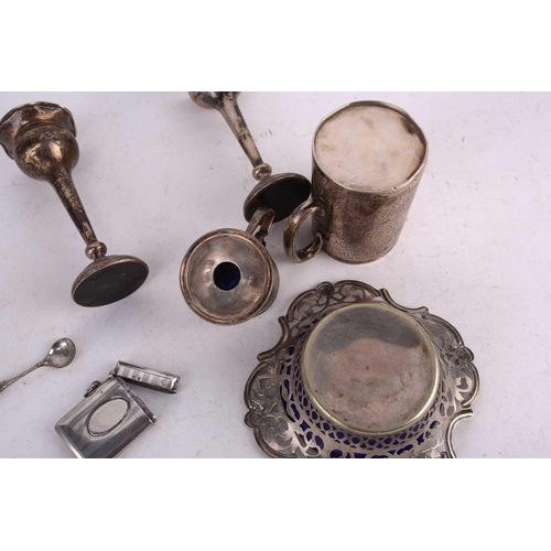 494 - A small collection of silver and silver plate comprising a silver christening mug overall decorated ... 