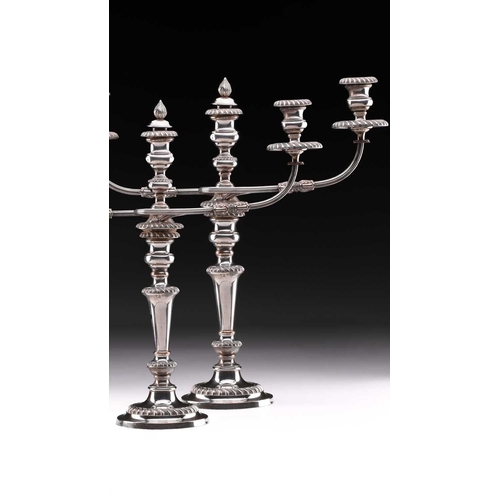 498 - A pair of large silver plated two branch candelabra, the two scroll branches with detachable gadroon... 