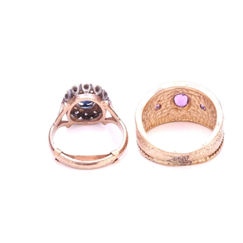 72 - Two gem-set rings in 9ct gold; to include a sapphire and diamond cluster ring, centred with a deep b... 