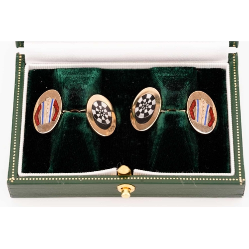 86 - A pair of Longmire racing colours cufflinks in 18ct yellow gold, the oval panels have painted enamel... 