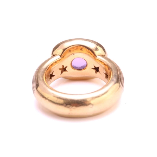 96 - An amethyst dress ring in 18ct yellow gold, comprising a rectangular buff-top amethyst with a facete... 