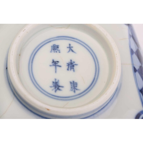 197 - A Chinese blue and white porcelain canted square section bowl the interior painted with boys a play ... 