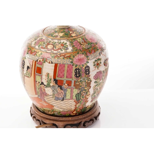 200 - A Chinese Famile Rose porcelain lamp of globular form, 20th century, painted with figures in interio... 