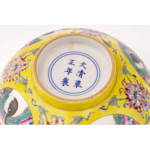 205 - A Chinese porcelain bowl, painted with roundels of cranes and peaches, bordered by lotus flowers and... 