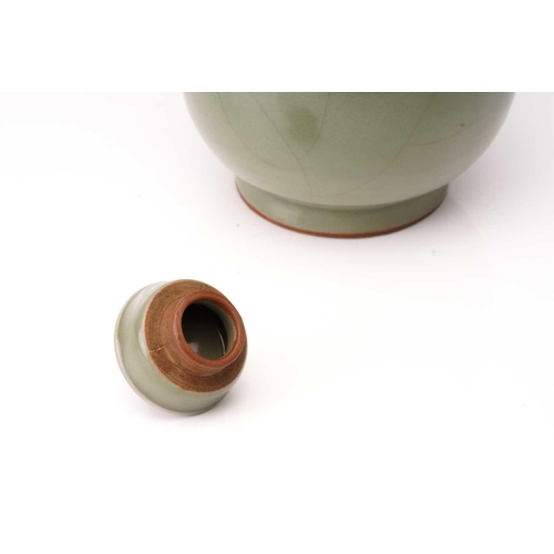 208 - A Chinese Song Dynasty style Celadon wine ewer and cover of baluster form fitted a swan neck spout a... 