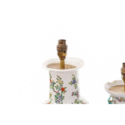 213 - A pair of Chinese Famile rose porcelain baluster vase form table lamps, 20th century, painted with c... 