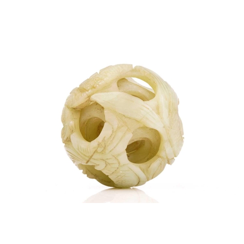 225 - A Chinese-carved pale green jade five-layer puzzle ball, 20th/21st century, the exterior carved with... 