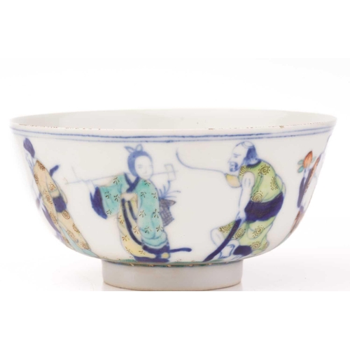 227 - A Chinese porcelain wucai bowl, painted with the eight immortals, above a band of waves, apocryphal ... 