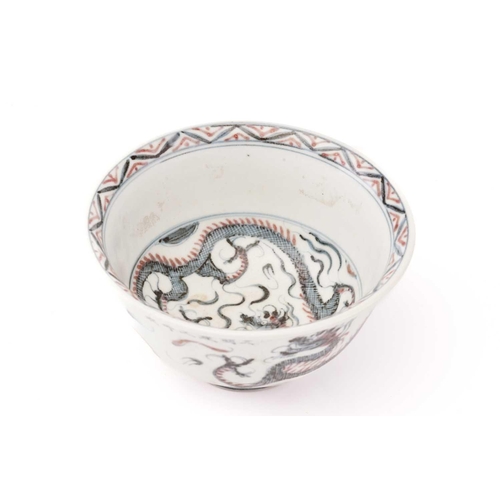 232 - A Chinese high sided dragon bowl, painted in the Ming style in iron red and blue, apocryphal Jianwen... 