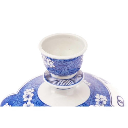 238 - A Chinese blue and white porcelain hookah pipe base of globular form, painted with reserves of antiq... 