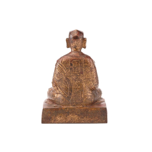 240 - A gilt-bronze figure of the Buddha seated in Vitaka mudra on a simple rectangular plinth. 17 cm wide... 