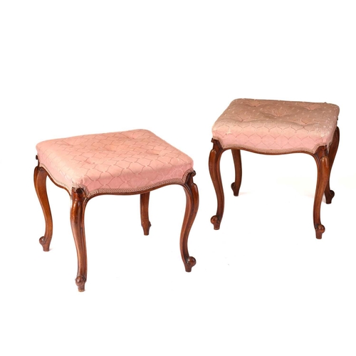 257 - A pair of Victorian walnut dressing stools with square stuff over seats and moulded cabriole legs. 4... 