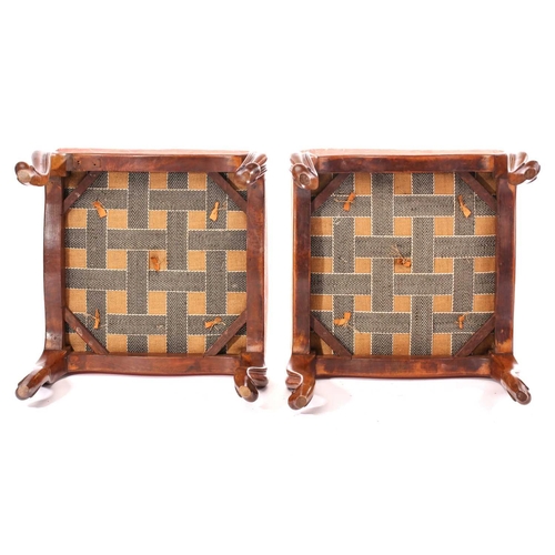 257 - A pair of Victorian walnut dressing stools with square stuff over seats and moulded cabriole legs. 4... 