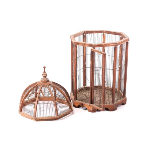 259 - A large domed circular section parrot cage, 20th century, with decorative finial and wirework bars, ... 