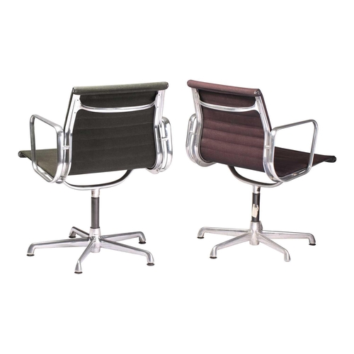 260 - Two Charles Eames vintage ICF (licensed) aluminium group armchairs with dark green and charcoal grey... 