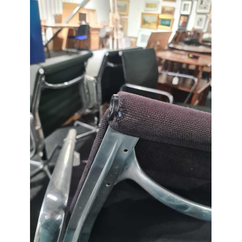 260 - Two Charles Eames vintage ICF (licensed) aluminium group armchairs with dark green and charcoal grey... 