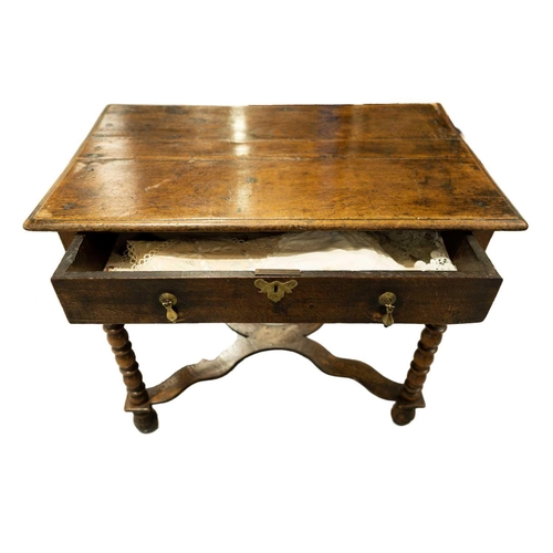 266 - A William and Mary single drawer side table with bobbin and fillet legs united by a shaped stretcher... 