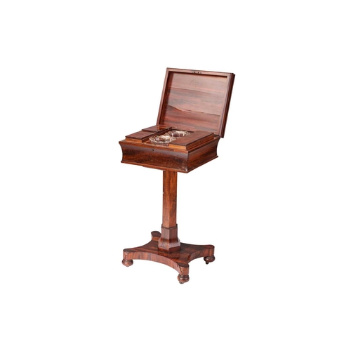 270 - A William IV rosewood teapoy, the moulded hinged lid enclosing four removable lidded caddies and two... 