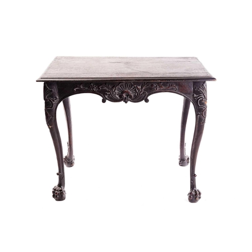 281 - An early 18th-century style carved oak side table with a single frieze drawer with a large shell mot... 