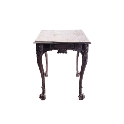 281 - An early 18th-century style carved oak side table with a single frieze drawer with a large shell mot... 