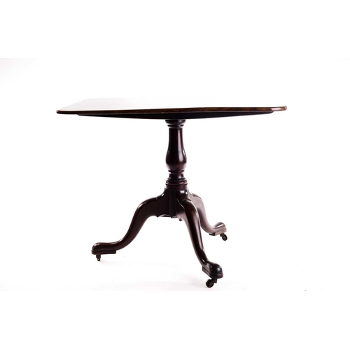 282 - A George III mahogany rectangular topped snap top tripod table with baluster column and cabriole leg... 