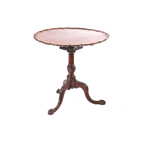 286 - A George III mahogany piecrust edged circular snap top tripod table, with birdcage and gadrooned urn... 