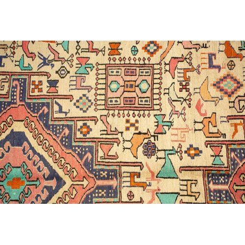 305 - An ivory ground Silk Soumak (Indian?) with three diamond lozenge design and the field filled with ma... 