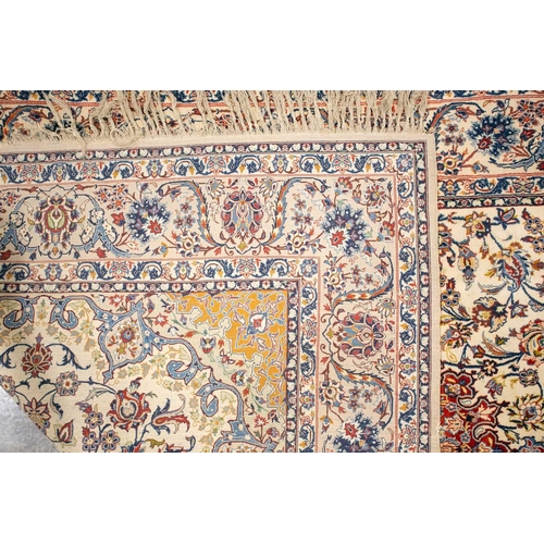 309 - An ivory ground Isfahan rug with central star boss and hanging lanterns on a field of palmetes and s... 