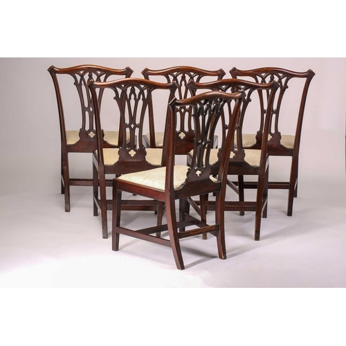 333 - A set of six George III style mahogany dining chairs, early 20th century, with bow cresting rails ov... 