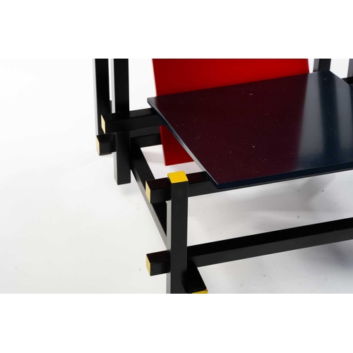 337 - After Gerrit Rietveld (Dutch 1888-1964) for Cassina, No 635 the red and blue lounge chair, painted i... 