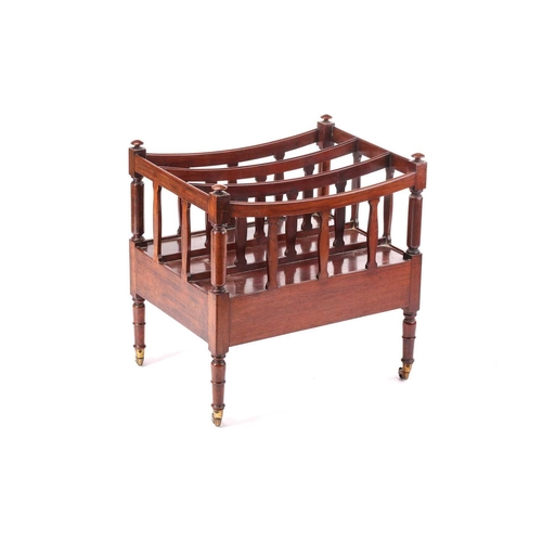 341 - A George IV mahogany Canterbury with turned end spindles and shaped superstructure above a single fr... 